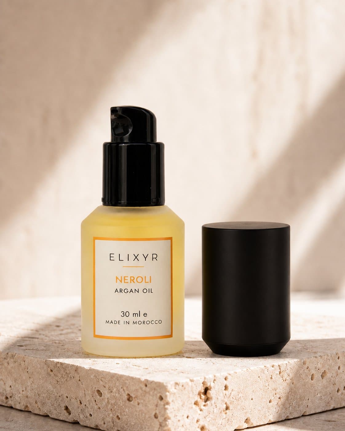 Neroli: pump revealed, with the separate cap beside it